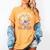 Just One More Chapter Skeleton Reading Book Bookworm Reader Women's Comfort Colors T-Shirt Mustard