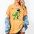 Kindergarten Graduation 1st Here We Come Class 2023 Dinosaur Women's Comfort Colors T-Shirt Mustard