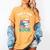 Take a Look It's In a Book Teacher Reading Apparel Women's Comfort Colors T-Shirt Mustard