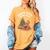 North Pole Book Club Gingerbread Christmas Reading Women's Comfort Colors T-Shirt Mustard