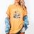 North Pole Book Club Hot Cocoa Served Daily Women's Comfort Colors T-Shirt Mustard