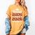 Proud Grandma Of A 2026 Graduate Class Of Graduation Women's Comfort Colors T-Shirt Mustard