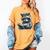 Raccoon With Book Cute Raccoons Reading Books Women's Comfort Colors T-Shirt Mustard