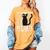 Read Banned Books Pet Cats Fight Evil Read Banned Books Women's Comfort Colors T-Shirt Mustard