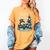 Reading Is Snow Much Fun Christmas Books Snowman Bookworm Women's Comfort Colors T-Shirt Mustard