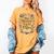 She Blooms Among The Pages Women Mom Wife Floral Book Lover Women's Comfort Colors T-Shirt Mustard