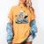 Skeleton Reading Book Floral Dark For Book Lovers Women's Comfort Colors T-Shirt Mustard