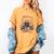 Tale As Old As Time Belles Book Shop Book Candles Tea Flower Women's Comfort Colors T-Shirt Mustard Tale As Old As Time Belles Book Shop Book Candles Tea Flower Women's Comfort Colors T-Shirt Mustard