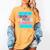 Threadless Grey Sky Chai Trans Book Pride Graphic Women's Comfort Colors T-Shirt Mustard