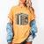 Tiny Portals Big Stories Book Nook Fantasy Gateway Women's Comfort Colors T-Shirt Mustard