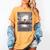 Totally Weird Tees Cat Library Book Reading Literary Women's Comfort Colors T-Shirt Mustard Totally Weird Tees Cat Library Book Reading Literary Women's Comfort Colors T-Shirt Mustard