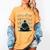 In A World Full Of Bookworms Be A Book Ninja Reading Reader Women's Comfort Colors T-Shirt Mustard In A World Full Of Bookworms Be A Book Ninja Reading Reader Women's Comfort Colors T-Shirt Mustard