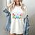 Book Lover Reading Penguin Women's Comfort Colors T-Shirt Ivory