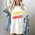 Powered By Comics And Snacks Comic Book Lover Women's Comfort Colors T-Shirt Ivory Powered By Comics And Snacks Comic Book Lover Women's Comfort Colors T-Shirt Ivory