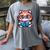 Adorable Book Lover Maine Coon Cat With Reading Glasses Cute Women's Comfort Colors T-Shirt Gray