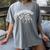 Book T-Rex Dino Bookworm Reading Book Dinosaur Women's Comfort Colors T-Shirt Gray Book T-Rex Dino Bookworm Reading Book Dinosaur Women's Comfort Colors T-Shirt Gray