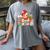 Christmas Gingerbread Man Reading Book Snowflake Teacher Women's Comfort Colors T-Shirt Gray Christmas Gingerbread Man Reading Book Snowflake Teacher Women's Comfort Colors T-Shirt Gray
