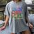 Color Our World Summer Reading 2025 Boho Wildflower Book Women's Comfort Colors T-Shirt Gray Color Our World Summer Reading 2025 Boho Wildflower Book Women's Comfort Colors T-Shirt Gray