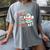 Cute Ghost Book Halloween Spooky Boo School Art Teacher Women's Comfort Colors T-Shirt Gray Cute Ghost Book Halloween Spooky Boo School Art Teacher Women's Comfort Colors T-Shirt Gray