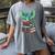 Dragon Reading Books Fantasy Lovers Mythical Creatures Women's Comfort Colors T-Shirt Gray Dragon Reading Books Fantasy Lovers Mythical Creatures Women's Comfort Colors T-Shirt Gray