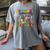 Everyone Communicates Differently Book Teacher Outfit Women's Comfort Colors T-Shirt Gray