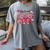 HUGvyn One Loved Teacher Valentine Book Heart Reading Bow Women's Comfort Colors T-Shirt Gray