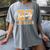 Junior Class 2027 Graduation Back To School Orange Letters Premium Tri-Blend Women's Comfort Colors T-Shirt Gray