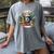 North Pole Book Club Books Reading Mug Gingerbread Women's Comfort Colors T-Shirt Gray North Pole Book Club Books Reading Mug Gingerbread Women's Comfort Colors T-Shirt Gray