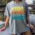 Retro Never Underestimate The Power Of a Boy With a Book Women's Comfort Colors T-Shirt Gray