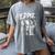 Stranger Things Hellfire Club Eddie Munson Memory Women's Comfort Colors T-Shirt Gray Stranger Things Hellfire Club Eddie Munson Memory Women's Comfort Colors T-Shirt Gray