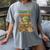 Unearth a Story Triceratops Dinosaur Reading Books Cute Dino Women's Comfort Colors T-Shirt Gray