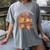 Valentine's Swooning Over Stories Cupid And Book Lover Tee Women's Comfort Colors T-Shirt Gray Valentine's Swooning Over Stories Cupid And Book Lover Tee Women's Comfort Colors T-Shirt Gray