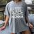 I Wear In Memory Of My Nonna Lung Cancer Women's Comfort Colors T-Shirt Gray I Wear In Memory Of My Nonna Lung Cancer Women's Comfort Colors T-Shirt Gray