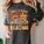 Fall In Love With Reading Autumn Pumpkin Teacher Book Lover Women's Comfort Colors T-Shirt Pepper
