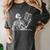 Hilarious Skeleton Holding a Book And Laughing Gothic Women's Comfort Colors T-Shirt Pepper