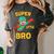 Little Cute Superhero Brother Comic Book Baby Bro Women's Comfort Colors T-Shirt Pepper Little Cute Superhero Brother Comic Book Baby Bro Women's Comfort Colors T-Shirt Pepper