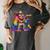 Rainbow Pride Bigfoot Reading Book With Heart Glasses Women's Comfort Colors T-Shirt Pepper