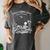 Read In Peace Skeleton Reading Book Halloween Bookish Women's Comfort Colors T-Shirt Pepper