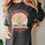 Unearth a Story 2026 Summer Reading Program Flowers Book Premium Tri-Blend Women's Comfort Colors T-Shirt Pepper