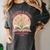 Women's Unearth a Story 2026 Summer Reading Program Flowers Book Women's Comfort Colors T-Shirt Pepper