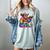 Rainbow Pride Bigfoot Reading Book With Heart Glasses Women's Comfort Colors T-Shirt Denim
