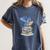 A Book A Day Keeps Reality Away Premium Tri-Blend Women's Comfort Colors T-Shirt Moss