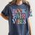 Book Fair Vibes Groovy Retro Reading Women's Comfort Colors T-Shirt Moss
