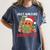 Book Reading Just Waiting For Christmas Gingerbread Women's Comfort Colors T-Shirt Moss Book Reading Just Waiting For Christmas Gingerbread Women's Comfort Colors T-Shirt Moss