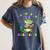 All Booked For Mardi Gras Crocodile Reading Book Teacher Women's Comfort Colors T-Shirt Moss