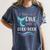 Cute Mermaid Librarian Teacher Dive Into A Good Book Reading Women's Comfort Colors T-Shirt Moss Cute Mermaid Librarian Teacher Dive Into A Good Book Reading Women's Comfort Colors T-Shirt Moss