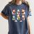Cute Snowman Reading Books Christmas Winter Book Lover Women's Comfort Colors T-Shirt Moss