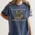 Easily Distracted By Books And Dragons Graphic Premium Women's Comfort Colors T-Shirt Moss