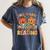 Fall In Love With Reading Autumn Pumpkin Teacher Book Lover Women's Comfort Colors T-Shirt Moss