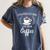 I'd Rather Stay Home And Drink Coffee Introvert Caffeine Pun Women's Comfort Colors T-Shirt Moss I'd Rather Stay Home And Drink Coffee Introvert Caffeine Pun Women's Comfort Colors T-Shirt Moss